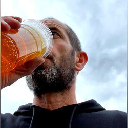 Bearded Man Enjoying a Beer
