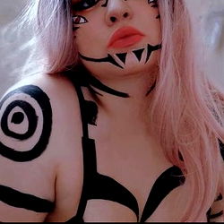 Aurora Skye, OnlyFans Model, in a Futuristic Outfit with Face Paint