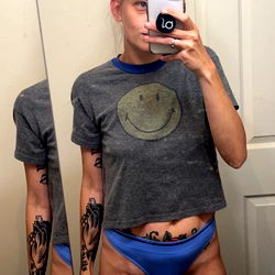 Alex from The Clouds: A Sizzling OnlyFans Model Shows Off Her Tattoos in a Casual, Chic Bathing Suit