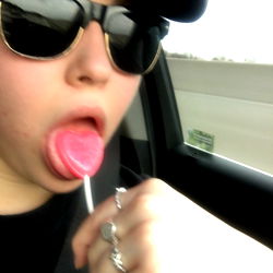 Marie, a 25-year-old woman, enjoying a sweet treat