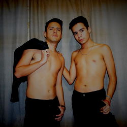 Alexydan, A Muscular Model Posing with a Shirtless Companion