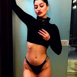 Stylish OnlyFans Model Ana Maria (AnittaC_) in Ridiculously Tight Tights and Crop Top