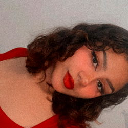 Red-Haired Woman in Red Dress