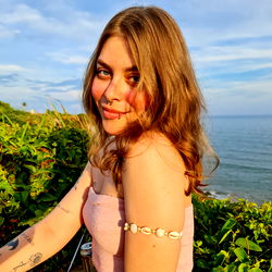 Julie's serene oceanic backdrop