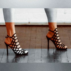 Fashion Model Showcasing High Heels in Studio