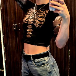 Punk Baby J Showing off Tattoos