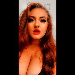 Lina's Eye-catching Look with Red Hair and Cat Ears