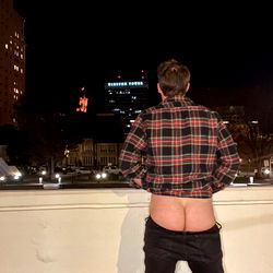 Greg's Rear View: A Nighttime Selfie with a Plaid Shirt and Jeans