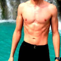 Model Posing Near Waterfall