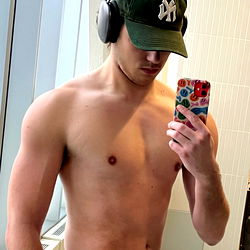 Shirtless Fitness Model in Gym