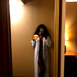 Sleek and Chic Model in Bathrobe at Home