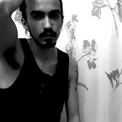 Model ArtJ in a Bathroom Mirror