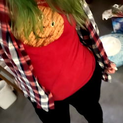 Fashionable Young Lady with Green Hair and Floral Jacket