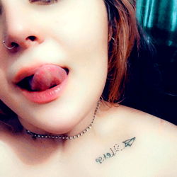 KaayCee's Playful Tattoo Show