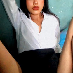 A Woman in a School Uniform with Red Lipstick
