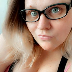 Curvybabe89: A Woman Posing with a Camera