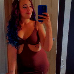 Tazz in a Brown Tight Dress