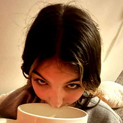 Woman Drinking Coffee, Casual Look with Smile