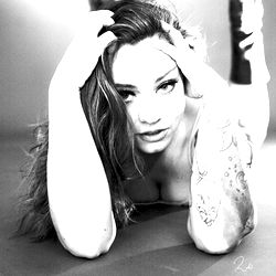 Onlyfans Model Posing Intimately in Black and White