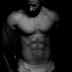 Photograph of Fitness Model Alex, Shirtless, Showcasing Physique