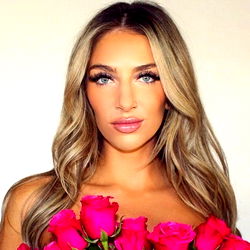 Ashmik, a Model with Blonde Hair and Pink Roses