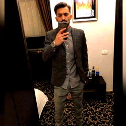 Fashionable Fella Posing in Hotel Room