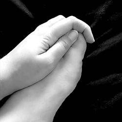 Hand of a person captured in black and white