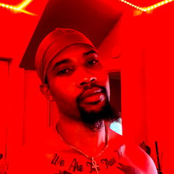 Long John in the Studio, Showing Off His Tattoos and Faded Haircut