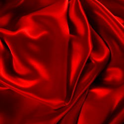 Mature Vixen in a Shiny Red Silk Gown