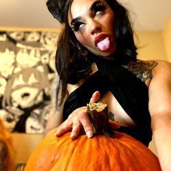 Selena the Onlyfans Model with a Halloween Pumpkin