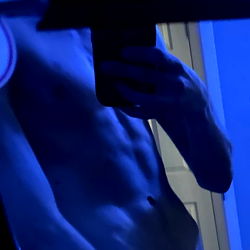 BareWithMe: Shirtless Model in Blue Light Room