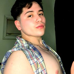 Fitness model Angel Rendon showcasing physique in tank top