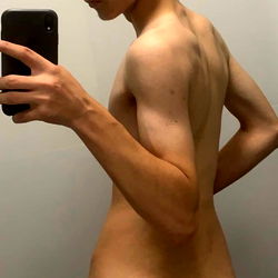 Alex, a young and fit individual, shares their body confidence. 📸