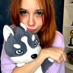 Model holding a stuffed animal