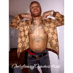 A Man with Tattoos and a Hip Hop Style