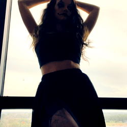 Ember Reanne, an OnlyFans Model Posing in a Skyscraper