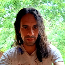 A man taking a selfie outdoors