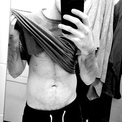 Fitness Model Shows Off Abs, Picks Up Towel