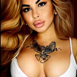 Glamourous Bella, Onlyfans Model Posing with Tattoo