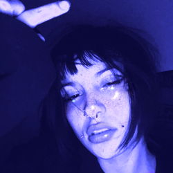 A Model in a Purple and Blue Themed Photo