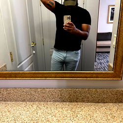 Casually Dressed Model in Hotel Bathroom