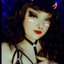 OnlyFans Model with Dark Hair and Devil Horns