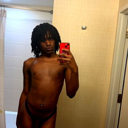 An OnlyFans Model Posing in a Hotel Room