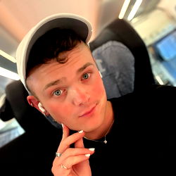 Aiden Hayes, a young adult male with striking features