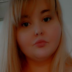 Blonde beauty posing for a selfie