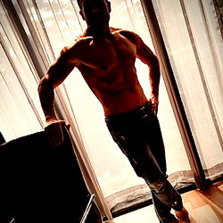 Carlos Joey Moises, a fitness model showcasing his physique