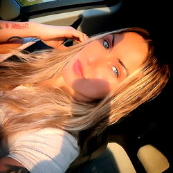 Amieya in a Sunlit Car