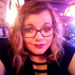 Daisy Cream posing at a bar