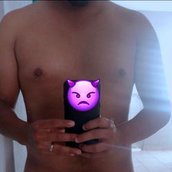 Shirtless Individual Holding Phone With Purple Emoji