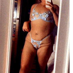 Abbie_x, a West Midlands OnlyFans Model Striking a Pose in Her Bathing Suit